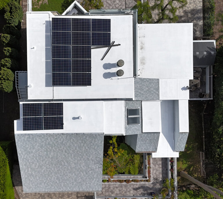 CertainTeed, Landmark Shingles, and an acrylic roof coating on the flat roofs.
