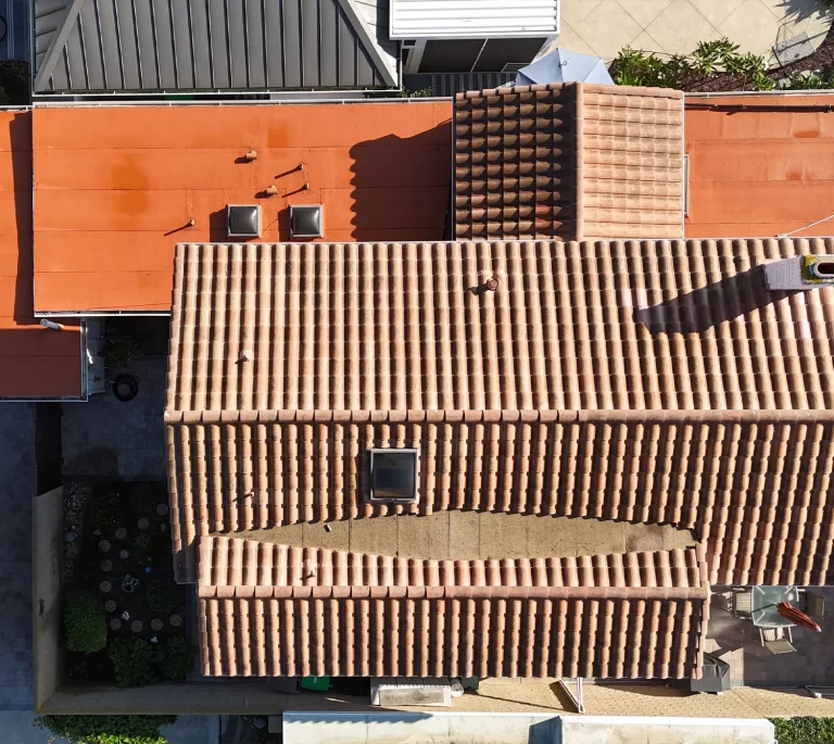 flat roof with torch down and terra-cotta color