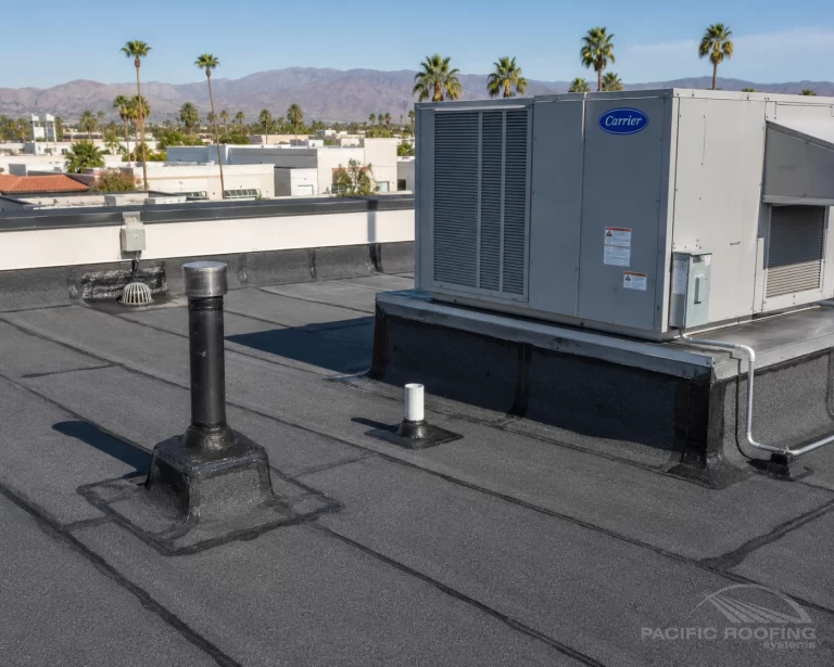 Torch down roofing installed around commercial rooftop equipment and penetrations